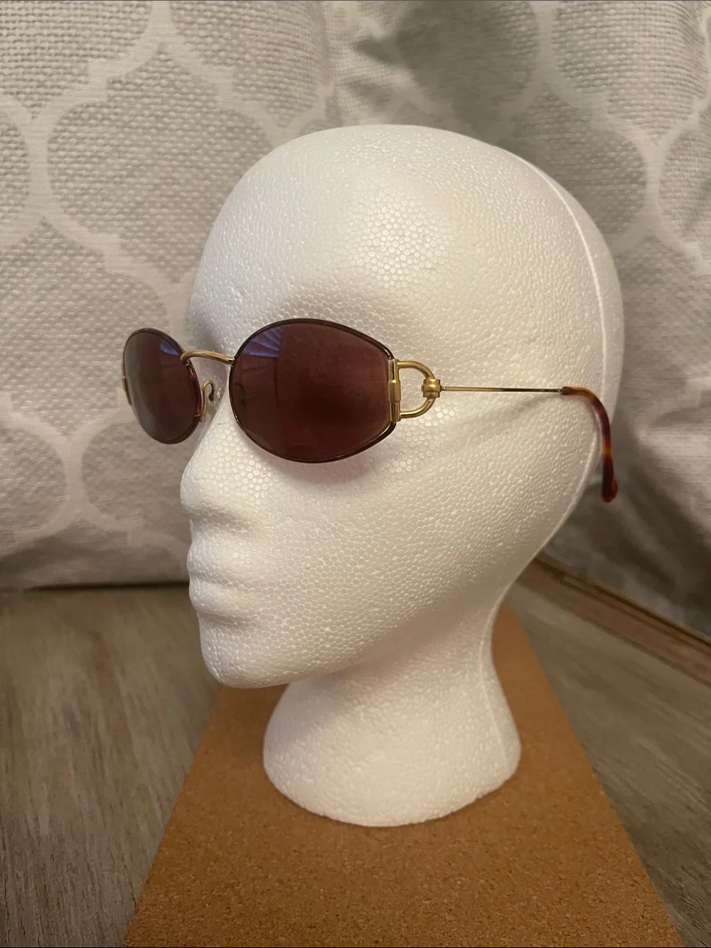 Gucci Oval Gold Frame Sunglasses with Brown Lenses